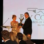 Claire Sherman, 2017 Chairman of the Board, thanks Robert Carroll, 2017 MAC Chair, for his service to the organization.